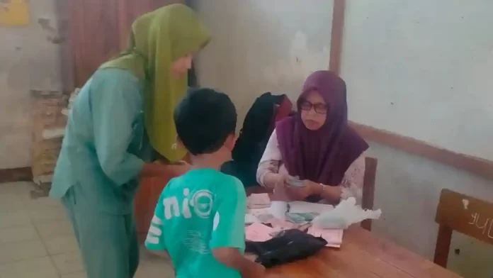 bupati nina minta keterlambatan pencairan tabungan siswa tidak boleh terulang